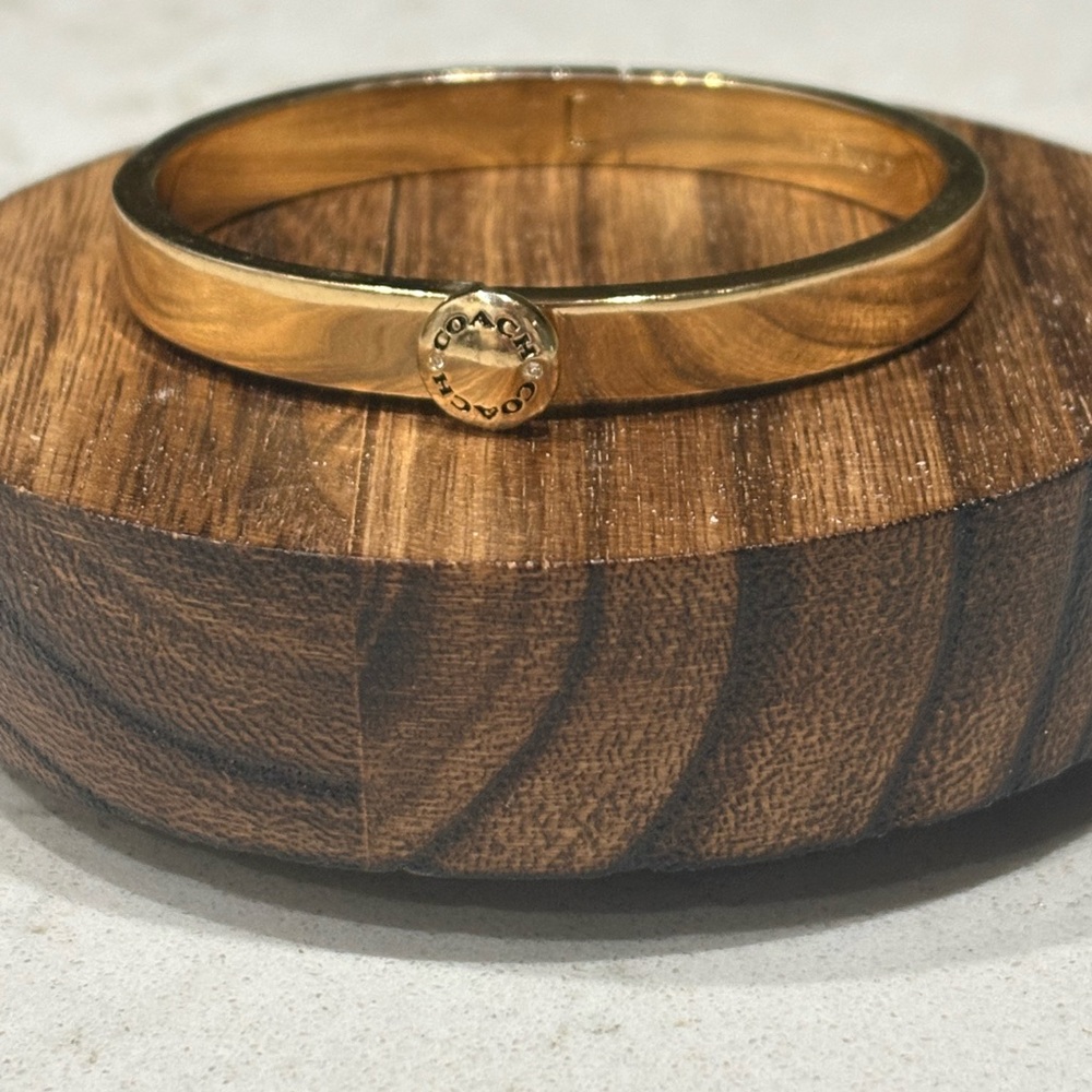 Coach Gold-Tone Slim Hinged Bangle with Logo Disc